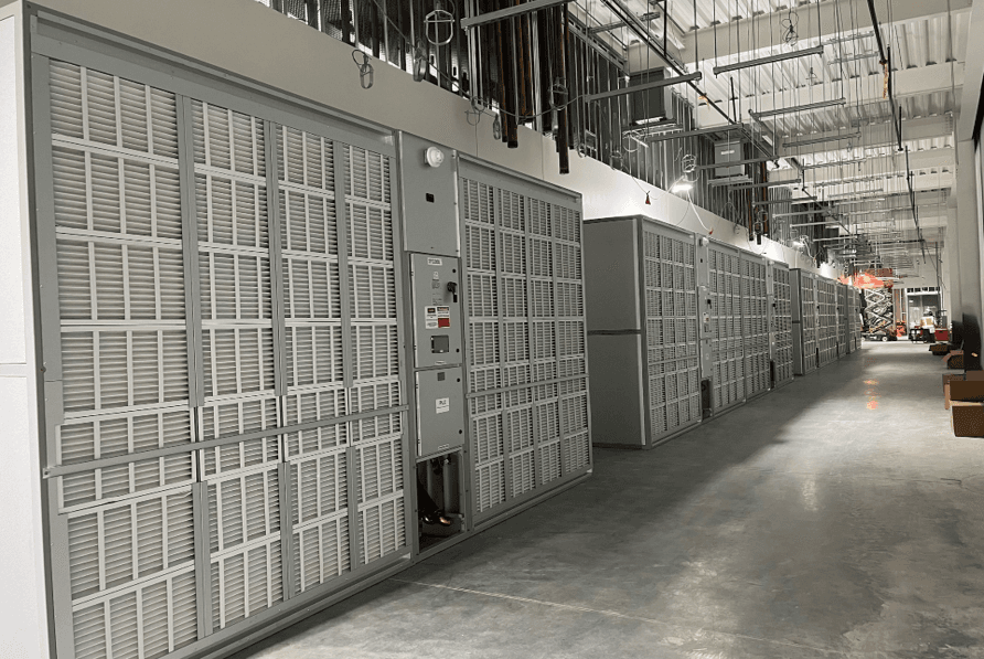 Teams collaborating over risk matrices in a modern workspace